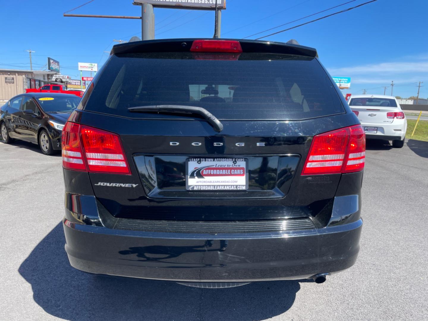 2018 Black Dodge Journey (3C4PDCAB5JT) with an 4-Cyl, 2.4 Liter engine, Automatic, 4-Spd w/AutoStick transmission, located at 8008 Warden Rd, Sherwood, AR, 72120, (501) 801-6100, 34.830078, -92.186684 - Photo#6